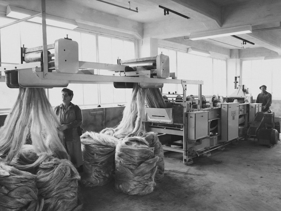 Modern cosmetic packaging factory with injection molding machines producing bottles and containers