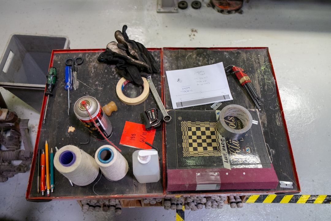 Disassembled lotion pump showing PP actuator, PE dip tube, stainless steel spring, and collar components