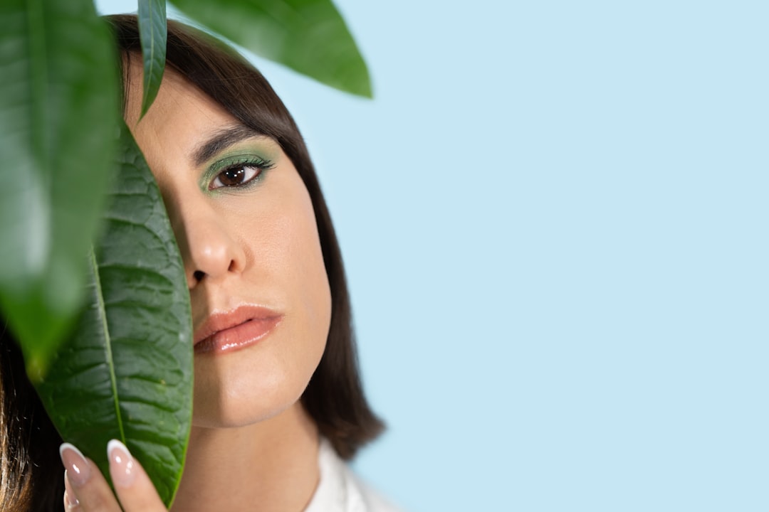 Organic certification auditor reviewing cosmetic packaging documentation during a facility inspection