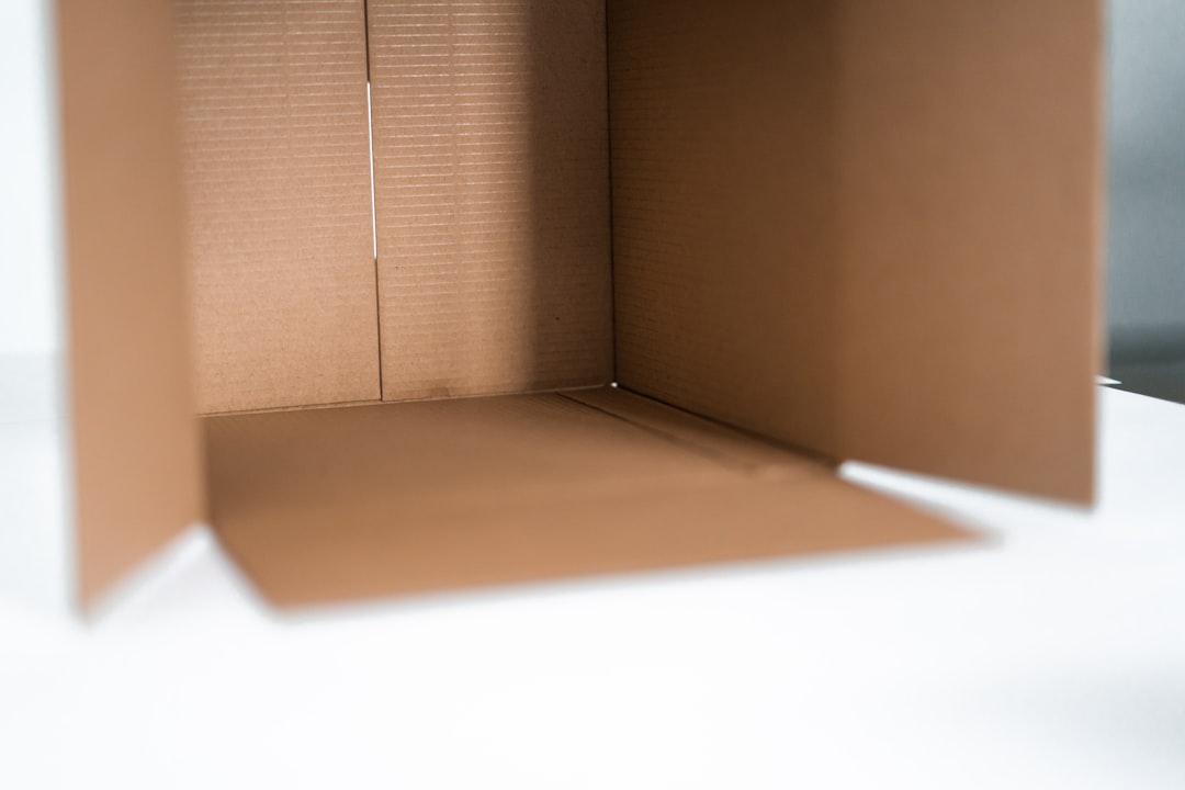 Insulated shipping carton with gel packs prepared for temperature-sensitive cosmetic product delivery